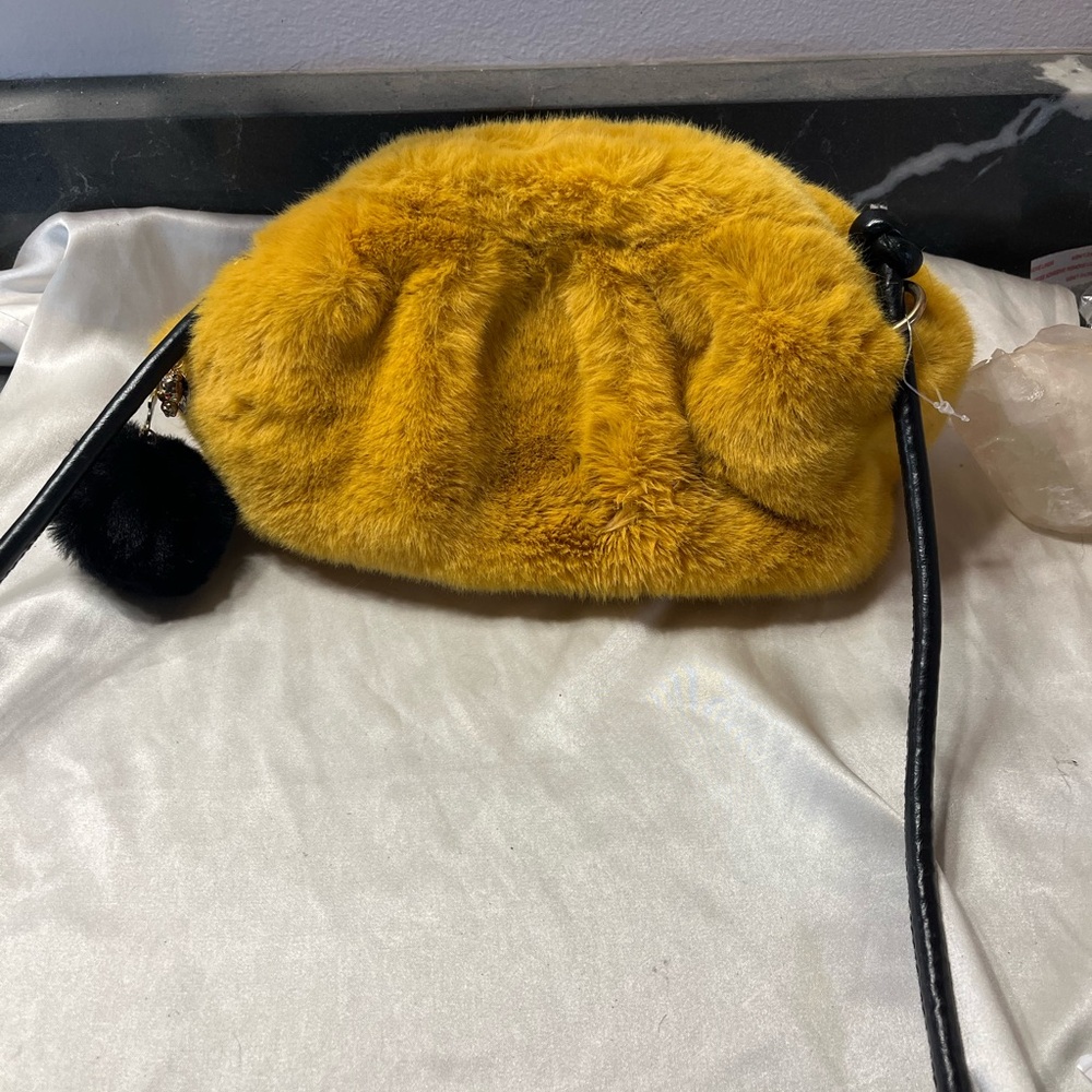 Fuzzy crossbody bag with charm